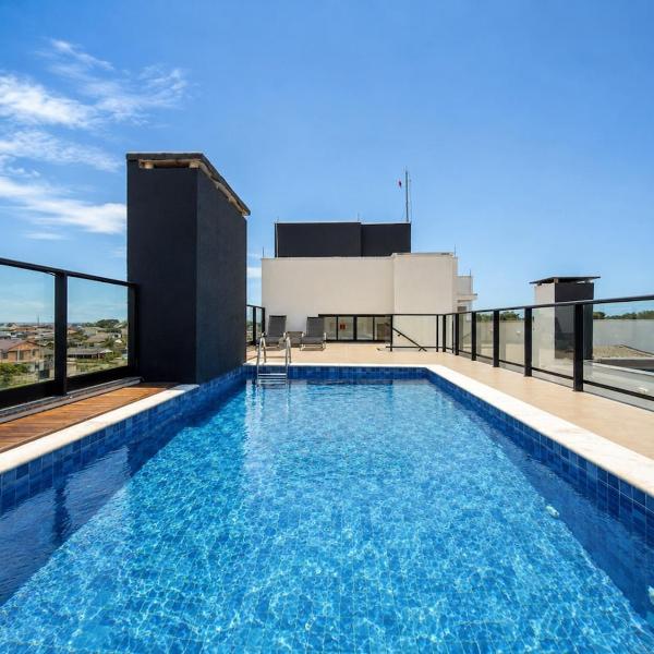 Apto a 550 m do mar com piscina e churrasqueira