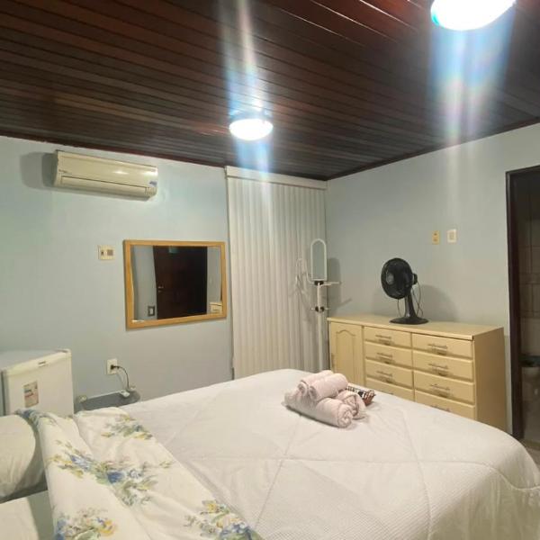 Quarto aconchegante com ar-condicionado e Wi-Fi