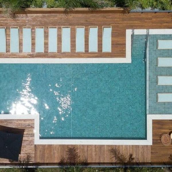 Studio com coworking, piscina e vista da cidade