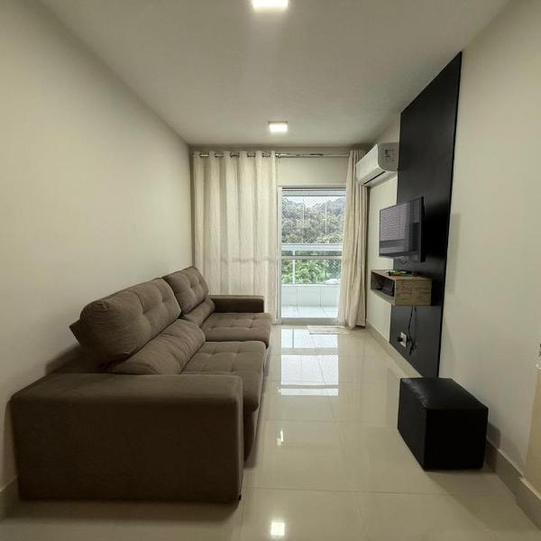Apartamento com churrasqueira 4 quadras da praia