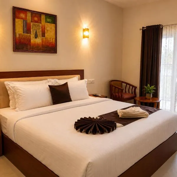 Wingstay Suites โรงแรมในเนดุมบัสเซรี