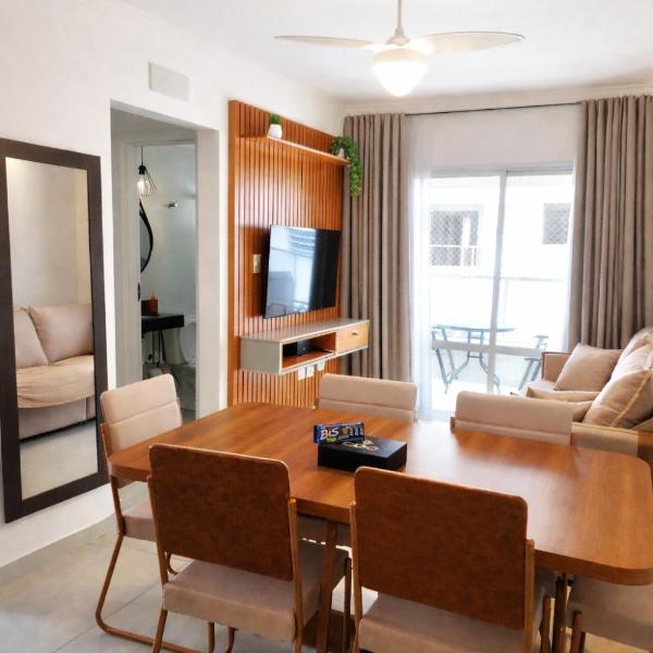 Pé na areia, roupa de cama, varanda com vista mar e churrasqueira