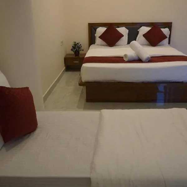 D D Luxury Inn، فندق في تشكماغالور