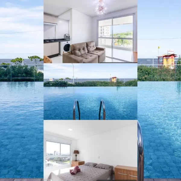 Aptos Pé na Areia Vista Mar Condomínio Resort Completo com Piscina borda Infinita, Beach Tennis, Academia, Sala de Jogos, Brinquedoteca, Playground e Portaria 24H 3 Quartos com Ar-Condicionado, Churrasqueira Privativa Reserve Agora e Viva essa Experiência, Hotel in Balneário Piçarras