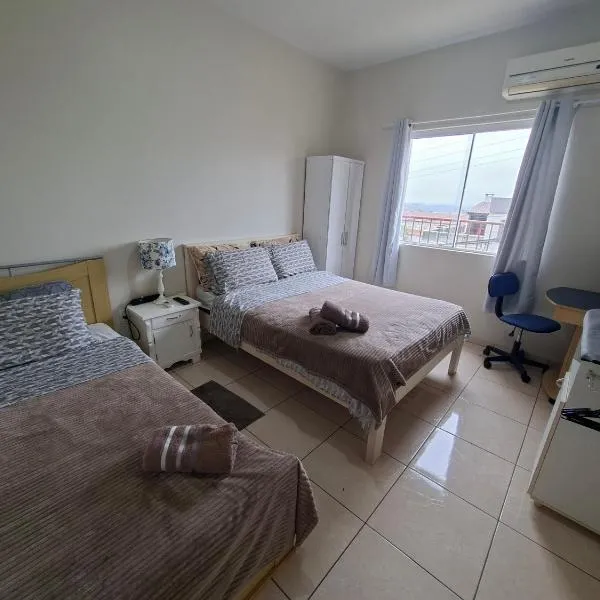 Apart próximo a Unimed, Catedral e HSA com 2 quartos com 2 ARES e garagem, хотел в Санто Анжело