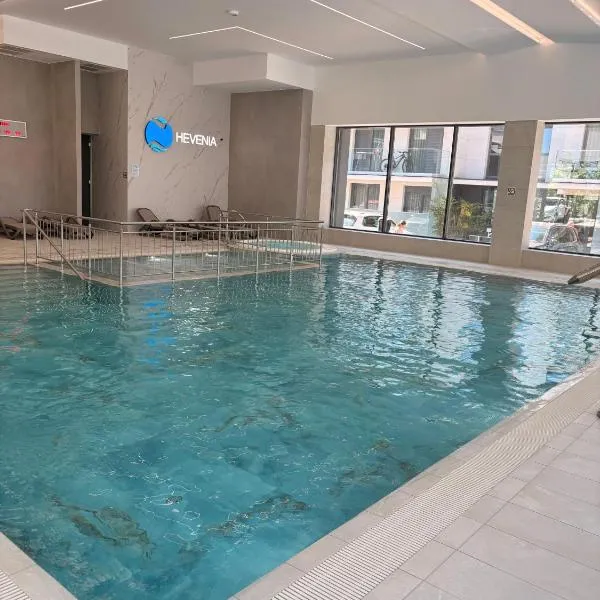 Baltic Room Hevenia apartament premium przy plaży z tarasem widokowym na otwarte morze SPA i basenami, Hotel in Pogorzelica