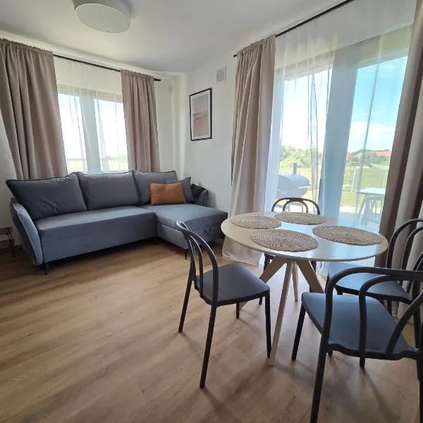 Sul Baltico Komfortowy Apartament 2 Sypialnie 10 min od Plaży Parking Taras Grill, hotel em Rewal