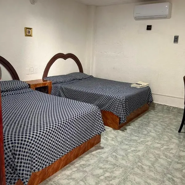 Casa de huespedes LOS SANTOS, hotel u gradu Kankun