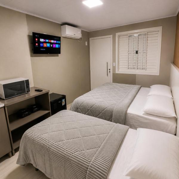 Loft Lux 4 Centro (Smart TV, ar-condicionado e cozinha completa)