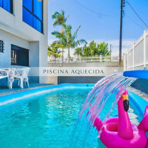 Casa a 100m da praia com piscina aquecida