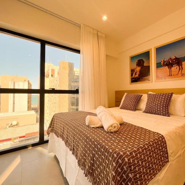 Apê Cairo · Veja o mar direto da sua cama e faça tudo a pé! - Foto 3