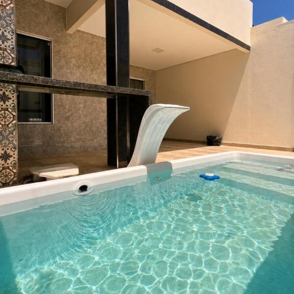 Casa Piscina Area de Churrasco Climatizada com 3 Quartos