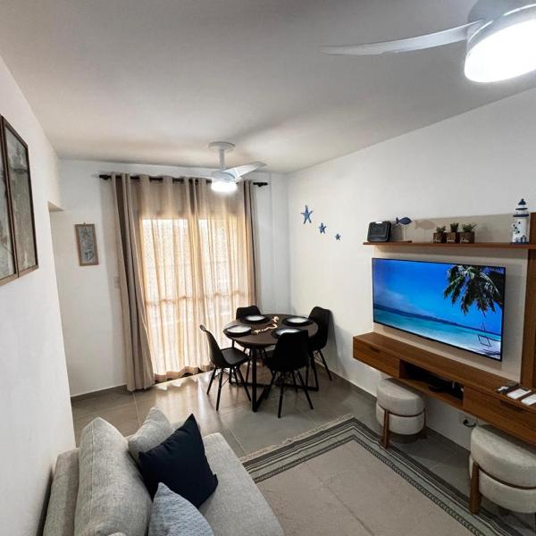 Apartamento a 60m da Praia Martim de Sá Caraguatatuba - Residencial Ilha de Córsega - A 5 min do Centro - Com piscina - Estacionamento gratuito privativo - 2 Quartos