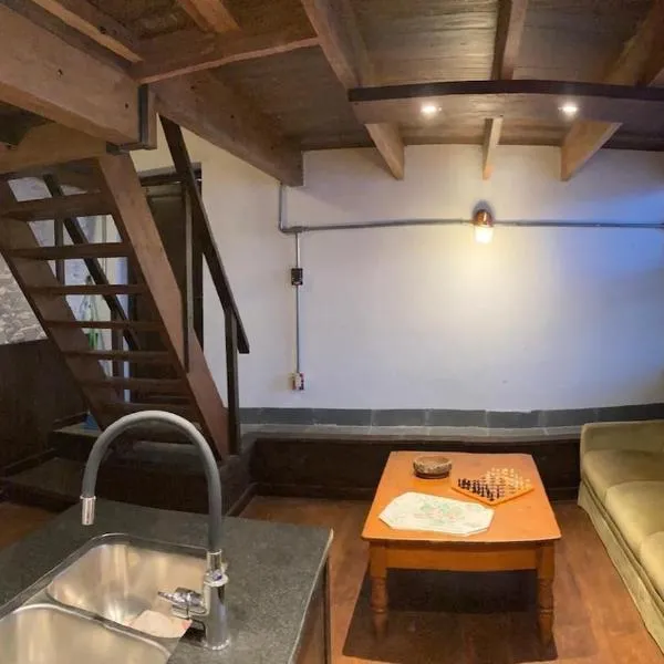 Loft de diseño ladrillo, madera y comodidad, Hotel in Paysandú