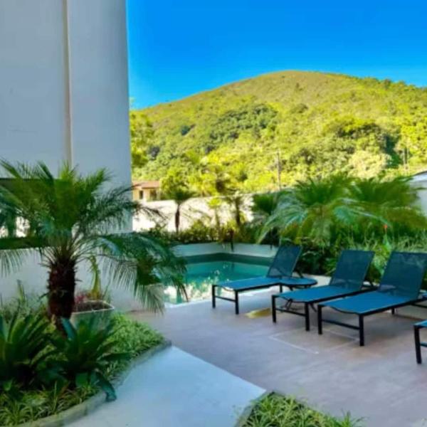 Apartamento a 60m da Praia Martim de Sá Caraguatatuba - Residencial Ilha de Córsega - A 5 min do Centro - Com piscina - Estacionamento gratuito privativo - 2 Quartos - Foto 4
