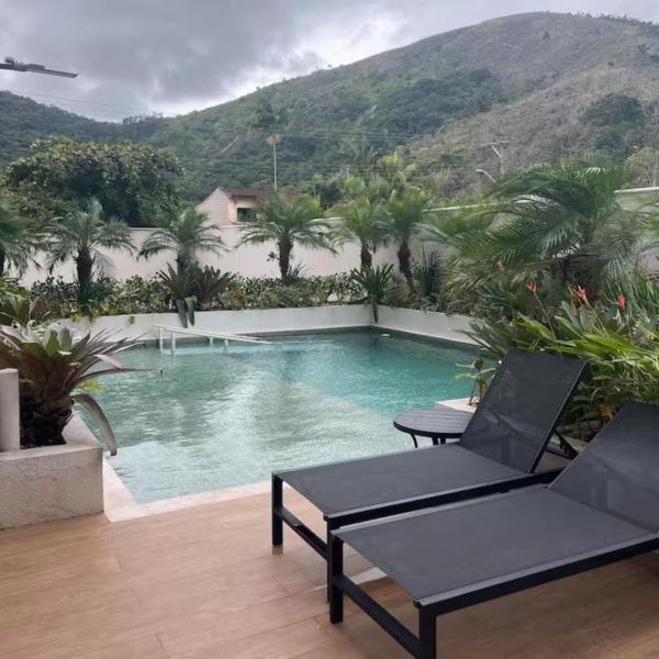 Apartamento a 60m da Praia Martim de Sá Caraguatatuba - Residencial Ilha de Córsega - A 5 min do Centro - Com piscina - Estacionamento gratuito privativo - 2 Quartos - Foto 3