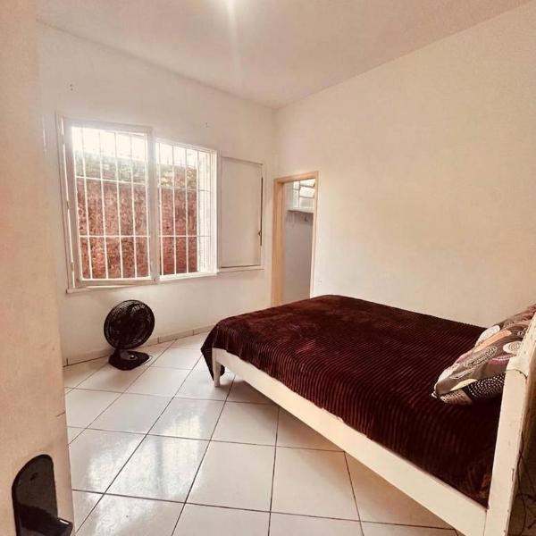Casa pé na área