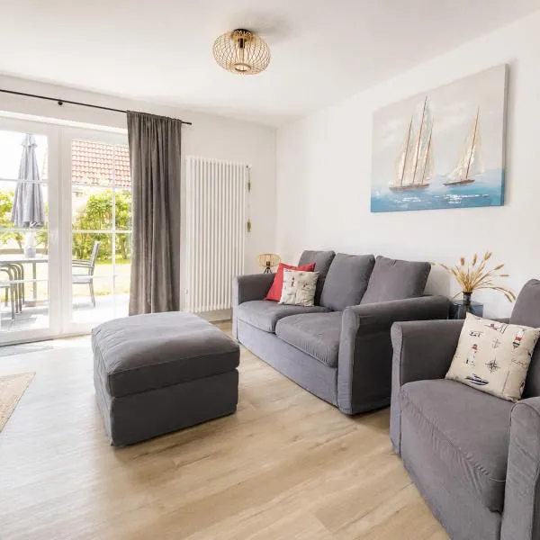 Nessmersiel, Renovierte Erdgeschosswohnung mit Garten, in Deichnähe, Wallbox,, hotel en Nessmersiel