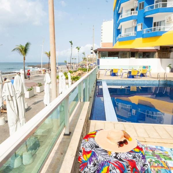 Pé na Areia - Flat com Piscina, Ar e Garagem na Barra