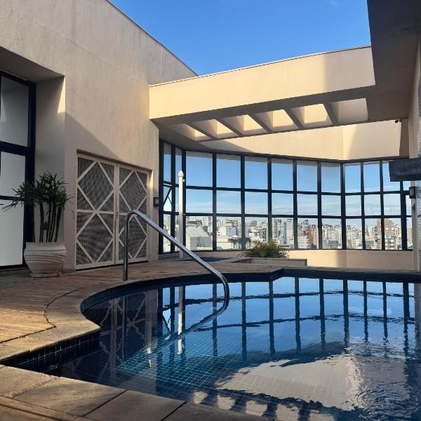 Flat nos Jardins com vaga e piscina