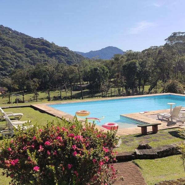 Casa agradável em uma propriedade linda e tranquila na serra