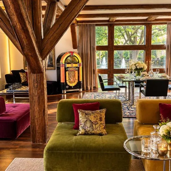 Viesnīca SCHLOSSRESIDENZ - Boutique Apartments & Hotel Suiten pilsētā Garbsene