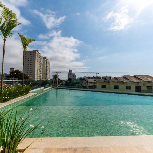 Apto Vista Mar a 350m da Praia da Armaçao e 10 min do Beto Carrero World com Piscina Sala de Jogos Brinquedoteca e Playground Ar Condicionado Sacada com Churrasqueira e Vaga Privativa Conforto Praia e Diversão para Toda a Familia - Foto 4