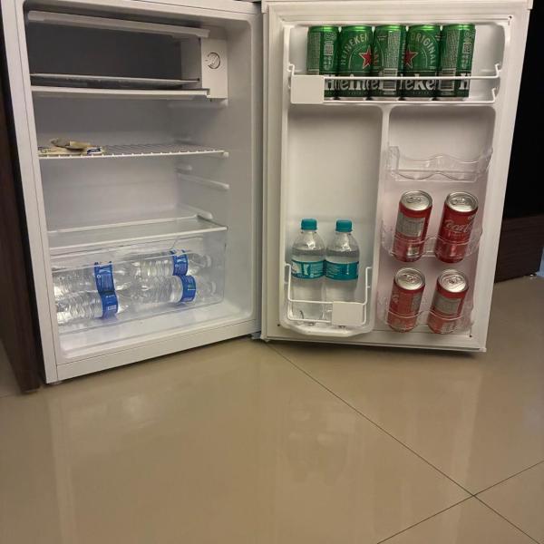 Suíte com TV 50 polegadas, ar-condicionado, frigobar e Wi Fi, sala e cozinha compartilhado - Foto 5