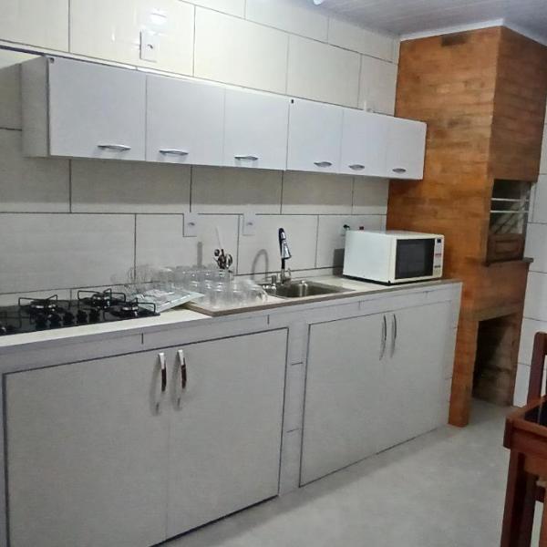 Casa de praia 2 dormitorios com ar condicionado,hurrasqueira, garagem, lavanderia e pfc - Foto 4