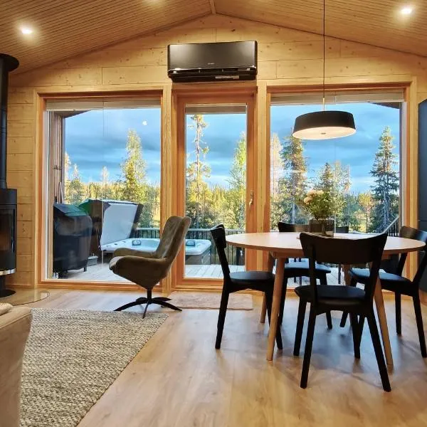 Peaceful Cabin with Hot Tub and Nature Views, Villa Lakeside Ruka, hotel di Ruka