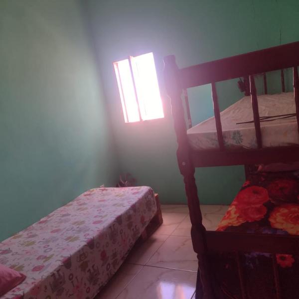Casa pé na área