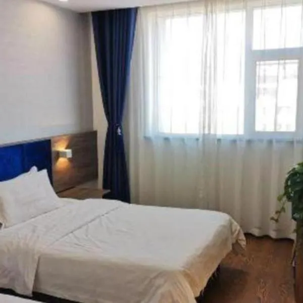 7 Days Inn Lvliang Bus Terminal, hotell i Luliang
