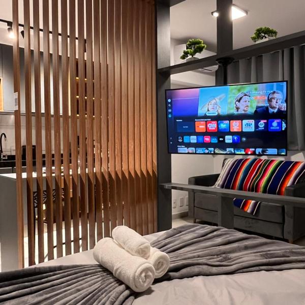 Studio 78 Luxo e conforto com Cama Queen Ar Cond Smart TV e Sofá Cama