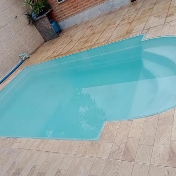 Seu refúgio com ar-condicionado a 150 metros da praia! Suíte