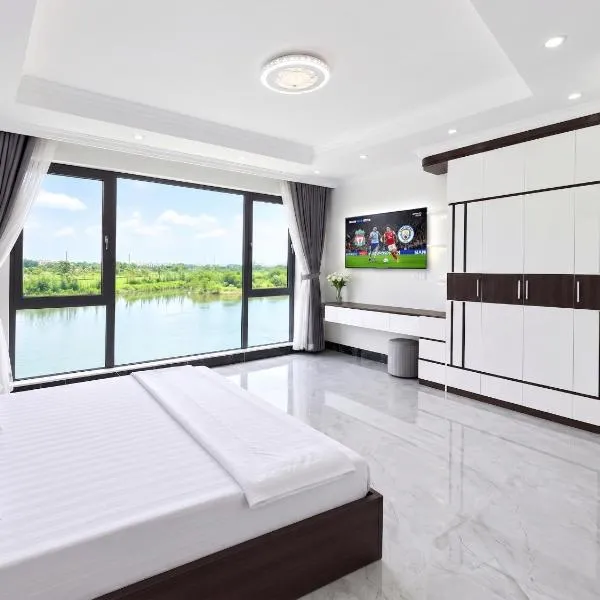 Vũ Yên - Aurion Homestay - Câu cá, View sân Golf và View trực diện pháo hoa Quảng trường - Golf course view & European Square fireworks view, מלון בBinh Hai