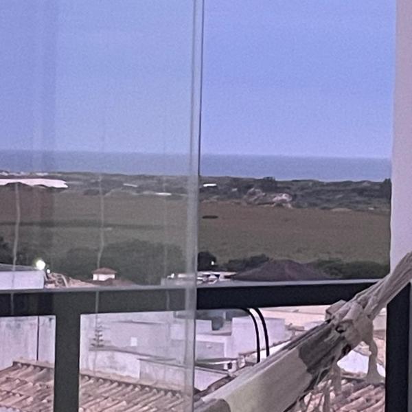 Suitizona e varanda vista ao Mar das Dunas do Pero