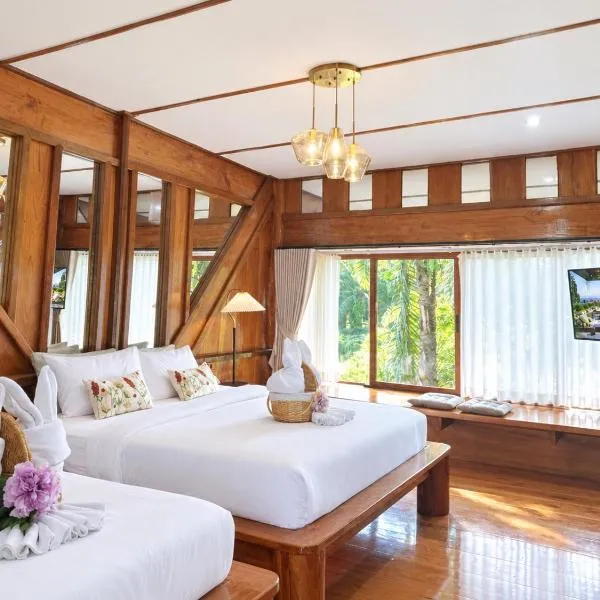 บ้านต้นไม้ The Tree House ณคอนศรี ติดวัดเจดีย์ ไอ้ไข่, hotelli kohteessa Ban Wat Boek