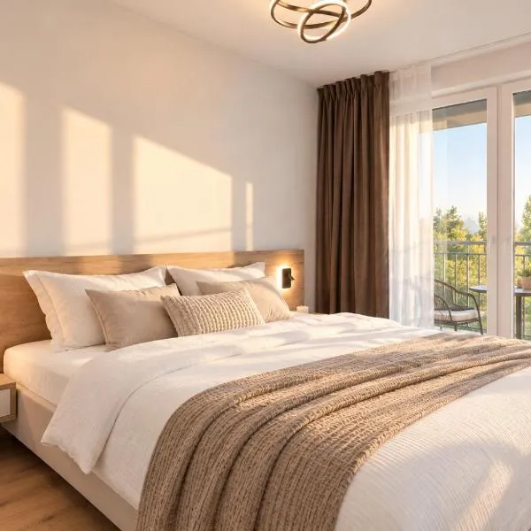 ALURE RESIDENCES 9 & 24h self check-in, private parking in front of the apartment building included, new building, terrace, the apartment building has its own park with a lake and outdoor fitness, children's playground, CITY CENTER, hotel Besztercebányán