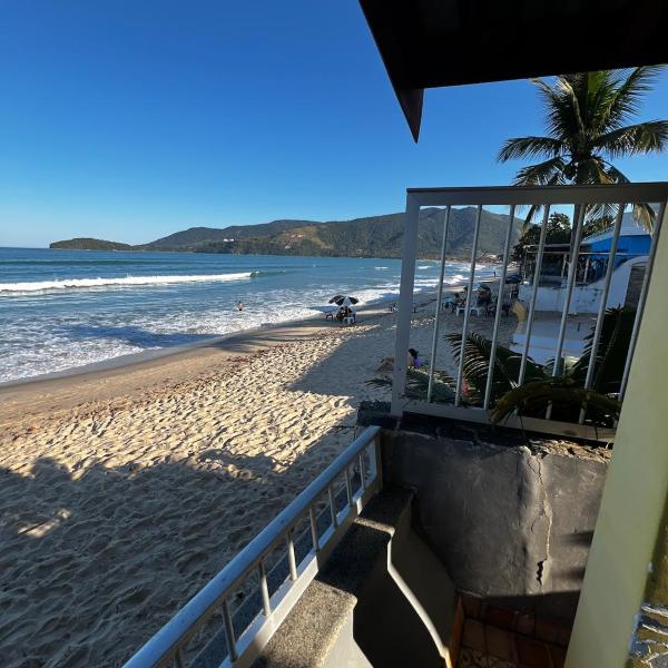 Casa pé na areia - frente ao mar