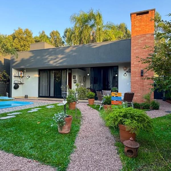 Casa - Pequena nos detalhes, grande nas memórias