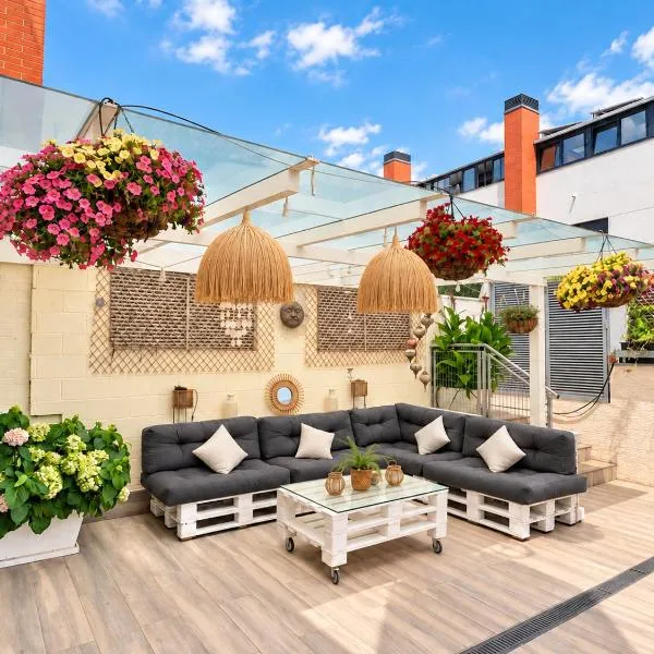 Chalet con jardín y piscina Madrid Warner โรงแรมในริวาส-วาเคียมาดริด