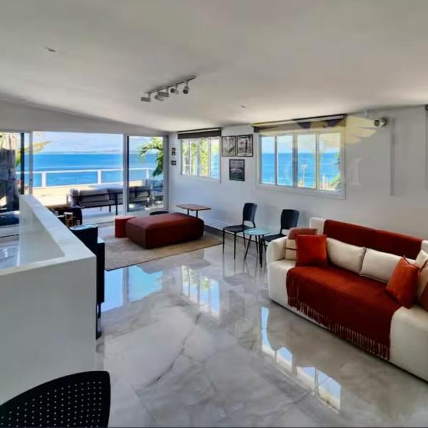 Luxury penthouse with terrace in front of the beach