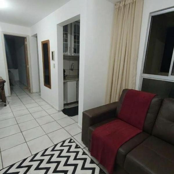 Apartamento confortável com estacionamento