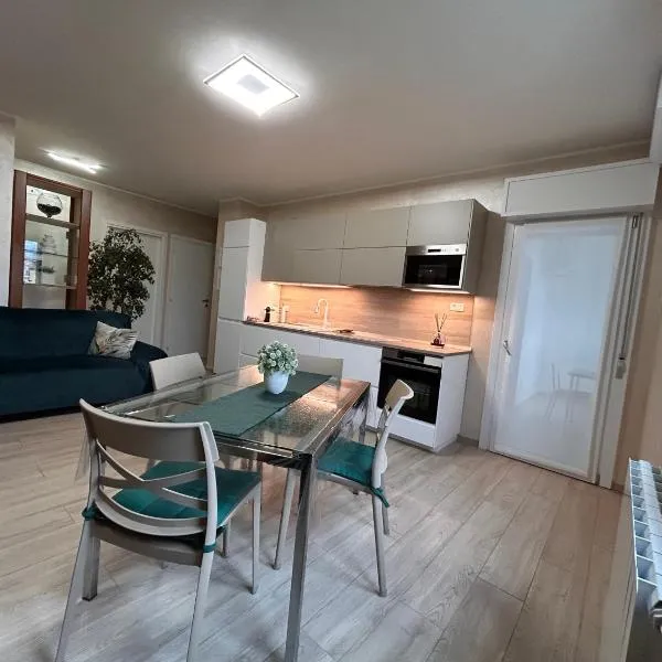 Appartamento Vista sul Castello - con garage privato gratuito, отель в Риволи