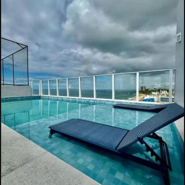 Apt na praia com Ar Cond e WiFi, Rooftop com piscina e academia