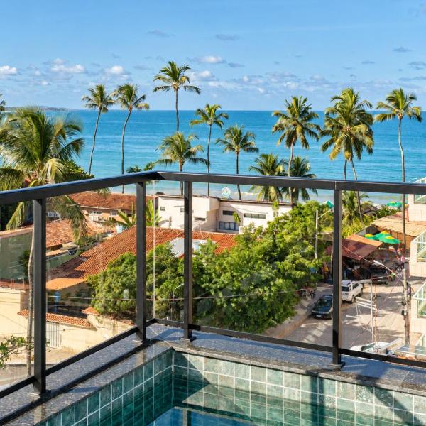 Centro da vila a 50m do mar com cozinha completa, varanda e piscina com vista panorâmica