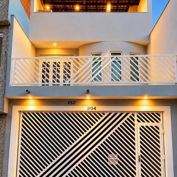 Casa Ampla 3 Quartos 2 garagem 300 metro do shopping