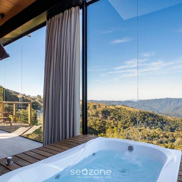 Chalé c/ jacuzzi priv. e vista Montanha VST043