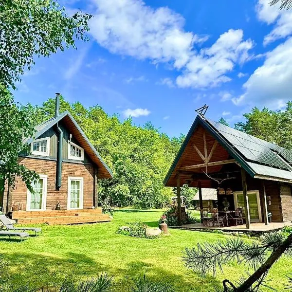Holiday homestead Camp of Forest Souls، فندق في Masališkės