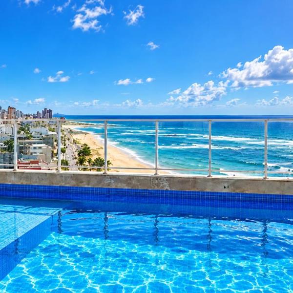 Apt 100m da praia com WiFi e Ar cond, piscina e academia no rooftop